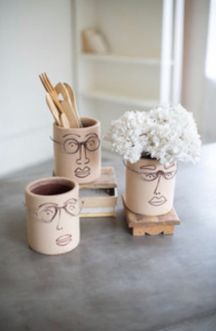 clay face planter with wire glasses, feathered farmhouse